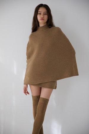 
                  
                    Load image into Gallery viewer, AMBROSIA KNIT PONCHO IN TEDDY
                  
                