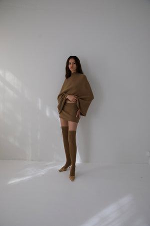 
                  
                    Load image into Gallery viewer, AMBROSIA KNIT PONCHO IN TEDDY
                  
                