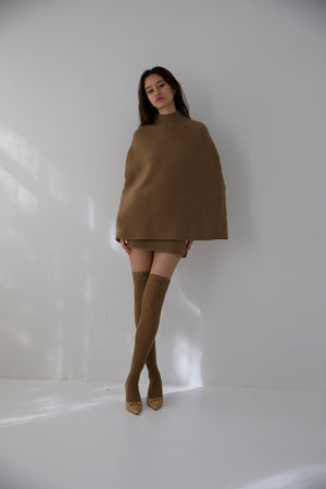 
                  
                    Load image into Gallery viewer, AMBROSIA KNIT PONCHO IN TEDDY
                  
                